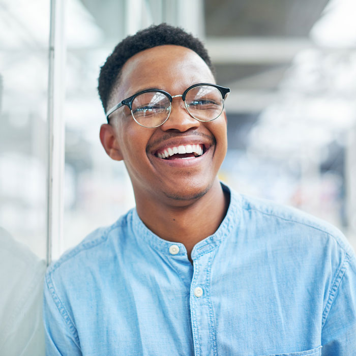 young adult male laughing