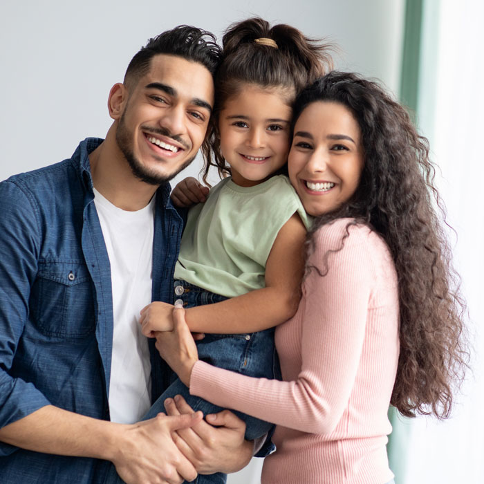 happy family with young daughter